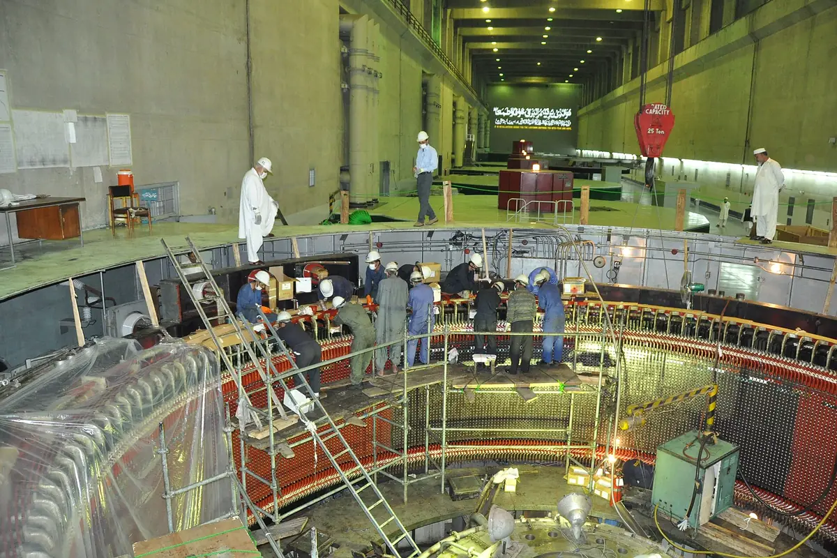 Crews rehabilitating a generator in the Tarbela Dam powerhouse